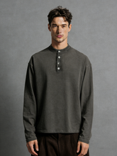 Embroidered long-sleeved top with frayed edges